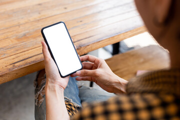 cell phone blank white screen mockup.hand holding texting using mobile on desk at office.background empty space for advertise.work people contact marketing business,technology