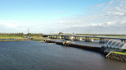Inflatable rubber dam balgstuw at Ramspol in inflated state seen from above. The Balgstuw dam at Ramspol can be inflated during storms stopping water from the Ketlemeer going in the Zwarte Meer.
