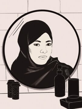 Hijabi woman looking in mirror 2