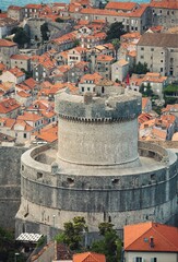 The Dubrovnik Bell Tower in Luza Square. It's also known as Susak Bell Tower built in the 14th century. Top of the tower, Belvedere, from which you can see beautiful view of the old city of Dubrovnik - obrazy, fototapety, plakaty