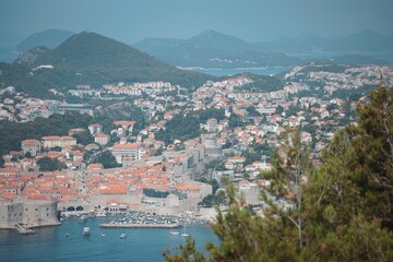 Fototapeta na wymiar Travel to Croatia. Summer sky. Popular tourist destination in Croatia, Dubrovnik has hundreds of tourists to take pictures of the medieval fortification that has become iconic of the city.