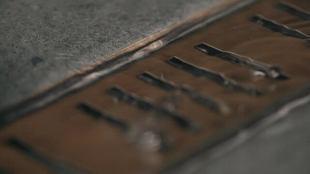 Close-up view of water flows into the shower drain