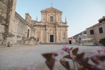 Fototapeta premium Travel in Croatia. Dubrovnik is amazing place to spend an afternoon very touristy but still historic and charming, relax at Adriatic Sea on the Croatian coast. Dubrovnik Cathedral world heritage site