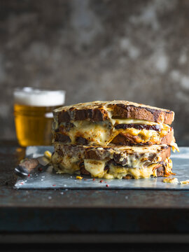 Croque Monsieur server with a lager beer, with copy space