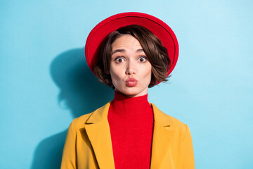 Photo of young attractive girl pouted lips send air kiss romantic feelings love isolated over blue color background