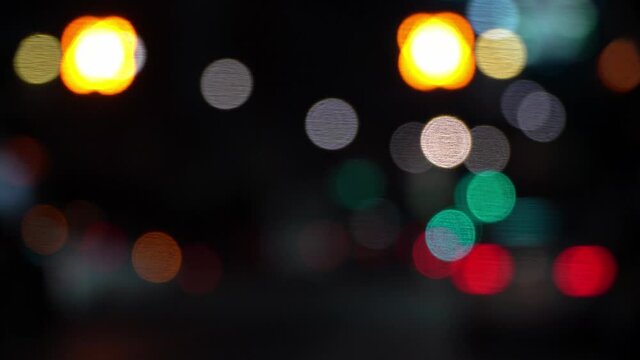 Beautiful sparkling bokeh in a dark blur background at night.