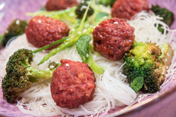Vegan soy protein meatballs with vegetables