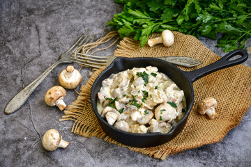 Obraz na płótnie Canvas Creamy chicken with mushrooms and parmesan. Home made italian ketogenic meal