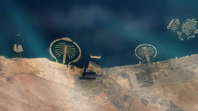Dubai Coastline and Palm Jumeirah Islands Seen from Space, United Arab Emirates - Elements of this Video furnished by NASA - 4K