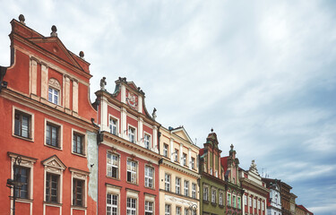 Fototapeta na wymiar Townhouses at Old Market Square in Poznan, color toning applied, Poland.