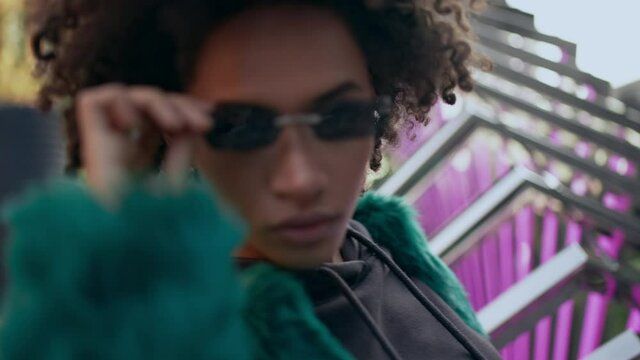 Young female rnb dancer rehearsing performance outdoors, style, fashion