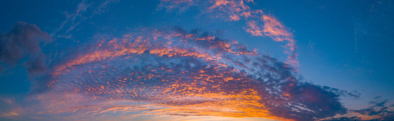 End of the day with a sky between clouds and very colorful, highlighting blue and orange.
