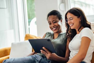 Adult women, searching something on the internet.
