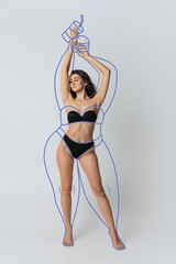 Artwork. Young beautiful woman with perfect body shape in lingerie, inner wear isolated over gray...
