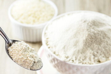 spoon of rice flour, alternative flour used as a gluten-free cooking ingredient