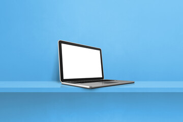 Laptop computer on blue shelf background