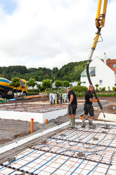Workers preparing foundations