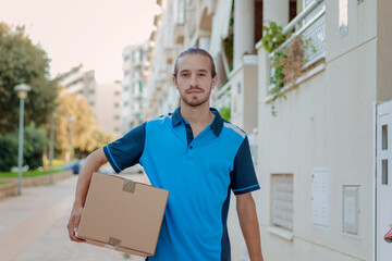 Delivery boy delivering a box