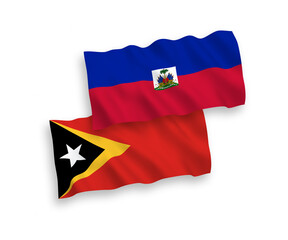 Flags of Republic of Haiti and East Timor on a white background