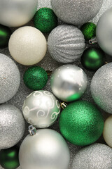 Green and silver christmas bauble balls background