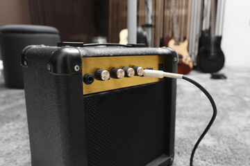 Guitar amplifier at recording studio, closeup. Music band practice