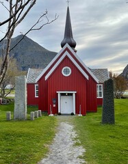 Fototapeta na wymiar red church surrounded by nature at Norway