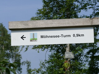 Signpost to the Moehneseeturm near the Moehne lake, Sauerland, North Rhine-Westphalia, Germany