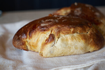 Homemade bread made from white flour close-up.  Sweet homemade bakery