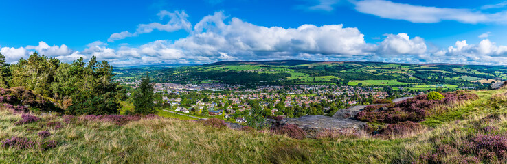 A panorama view from Ilkley moor over Wharfedale and the town of Ilkley Yorkshire, UK in summertime - obrazy, fototapety, plakaty