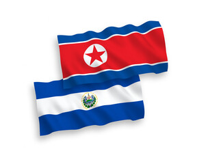 Fototapeta premium Flags of North Korea and Republic of El Salvador on a white background