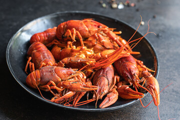 crayfish red fresh boiled seafood crustaceans meal snack on the table copy space food background rustic 