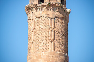 Detail image of a red sandstone minaret in southeast Turkey