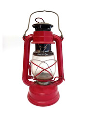 OLD BRONZE BOAT lamp on white background. Close up of red bronze kerosene lantern. Isolated retro oil lamp. Antique metal lantern with hanging hook on white background.