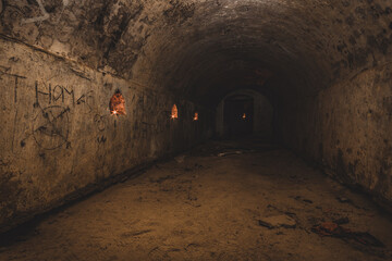 Fototapeta na wymiar An old abandoned air raid shelter a sandstone cellar and bunker