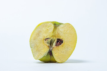 Quince on a white background. Delicious and healthy fruit