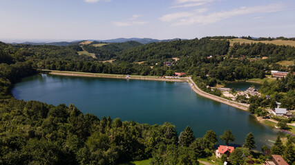 Fototapeta na wymiar Aerial view of Vindsachtske lake in the village of Stiavnicke Bane in Slovakia
