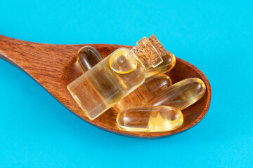 Spoon full of medicine capsules and pills, Medical concept