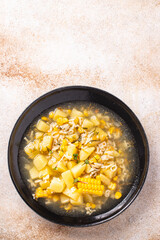 soup corn vegetable potatoe pasta, broth, chicken meat fresh portion meal snack on the table copy space food background 