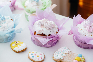 Beautiful Easter cakes on a decorated light table. A light holiday of Easter.
