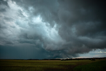 Fototapeta na wymiar storm clouds over the field