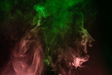 Green and pink steam on a black background.