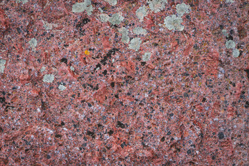 red black granite surface. Stone background. polished stone can be used for decoration, buildings, floors, tables, monuments	