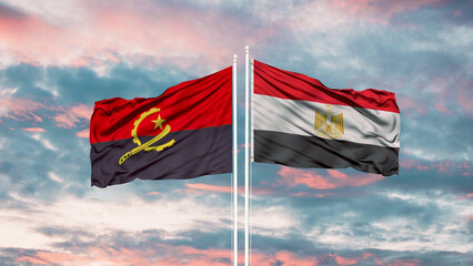 Egypt and Angola two flags on flagpoles and blue cloudy sky