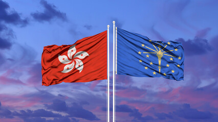 Hong Kong and Indiana flags on a flagpole. with sky background