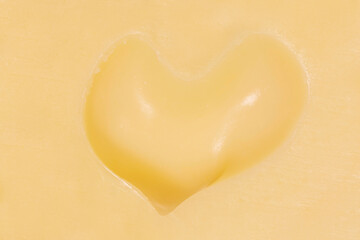 hole in shape of heart in maasdam cheese