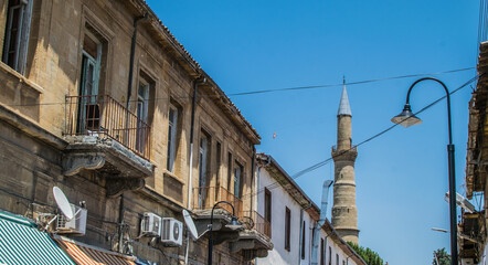 Facade of old neoclassic Greek house with balcony