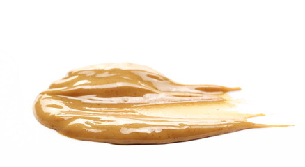 Peanut butter isolated on white background, side view