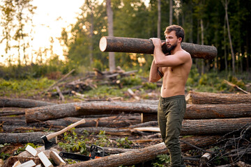 Bearded lumberjack. Brutal bearded lumberjack with ax in winter forest. Handsome man, hipster in...