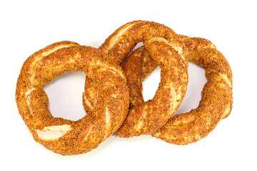 Turkish traditional sesame bagels. - Simit .     Isolated on white background.