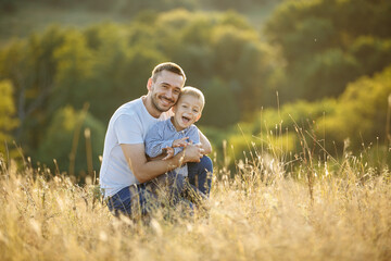 father and child in countryside